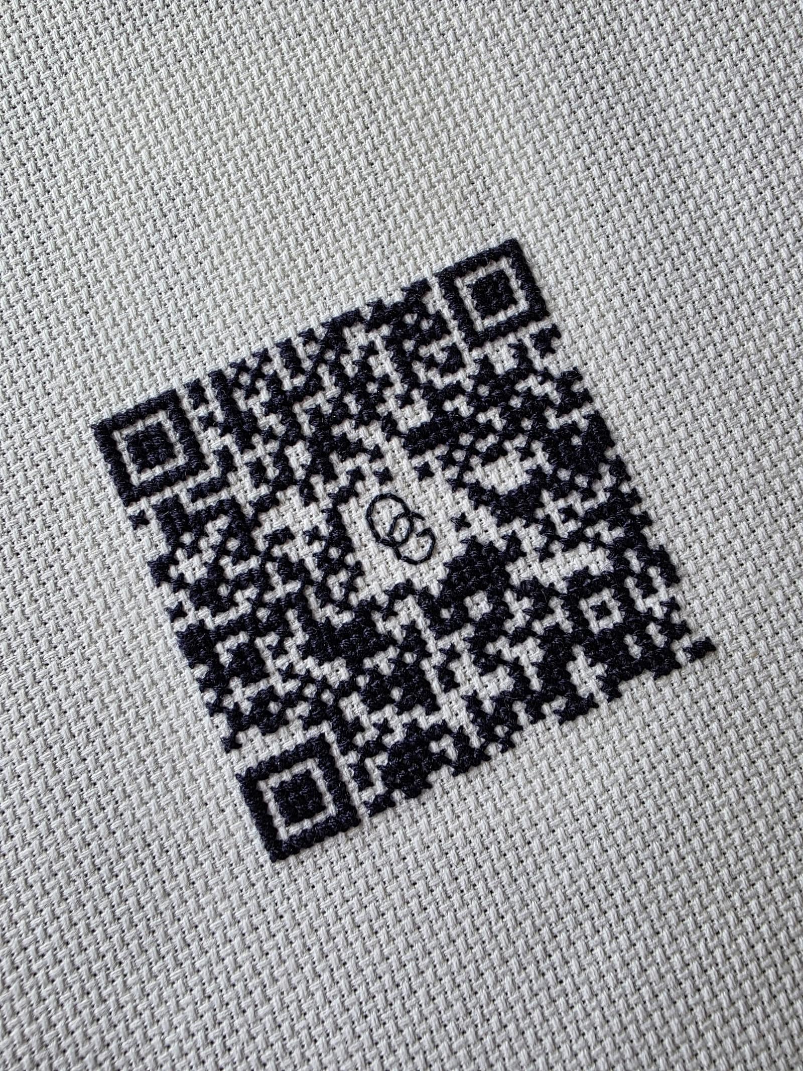 Cross stitched QR code for OG About Page